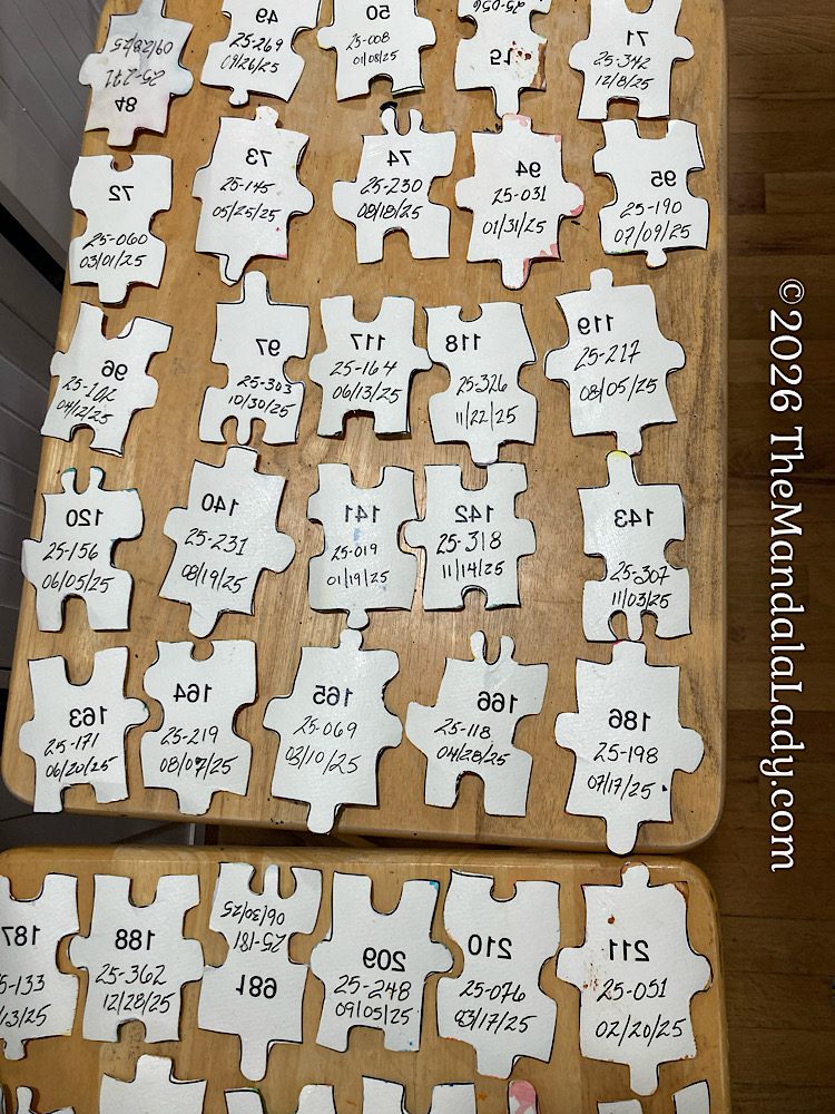 Puzzle Pieces with Golden Soft Gel Medium on the backs — ready to be attached to the wood panel